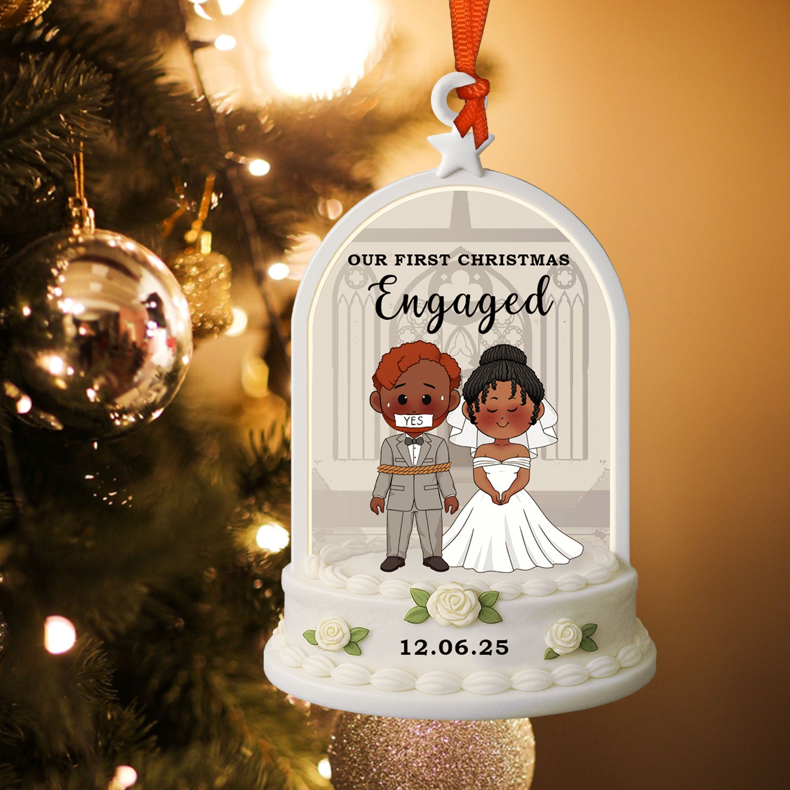 Custom couple wooden ornament with red ribbon hanging in front of a warm, blurry holiday Christmas tree background