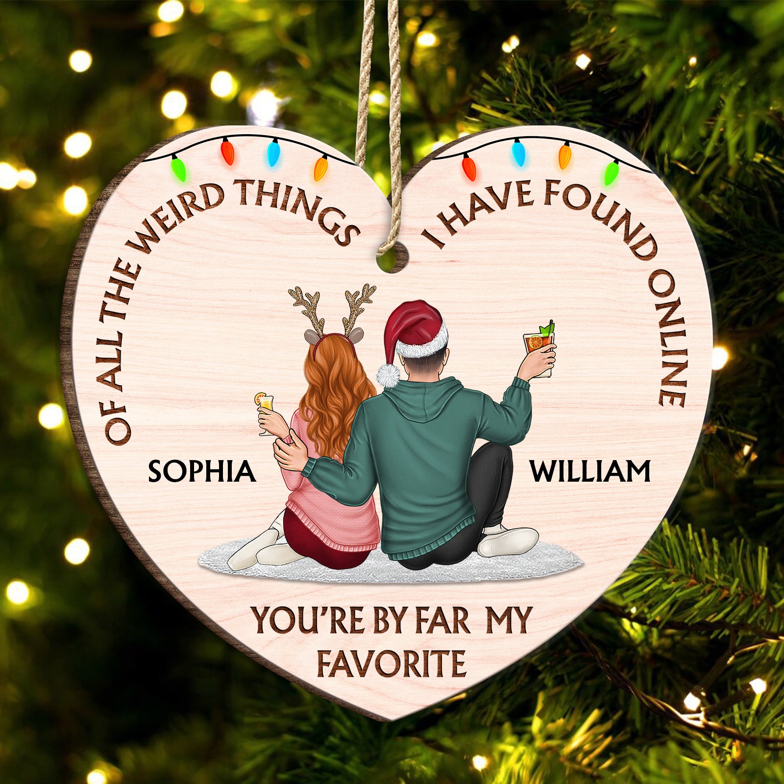 Personalized heart-shaped wooden Christmas ornament with funny quote "Of All The Weird Things I Have Found Online" and custom names