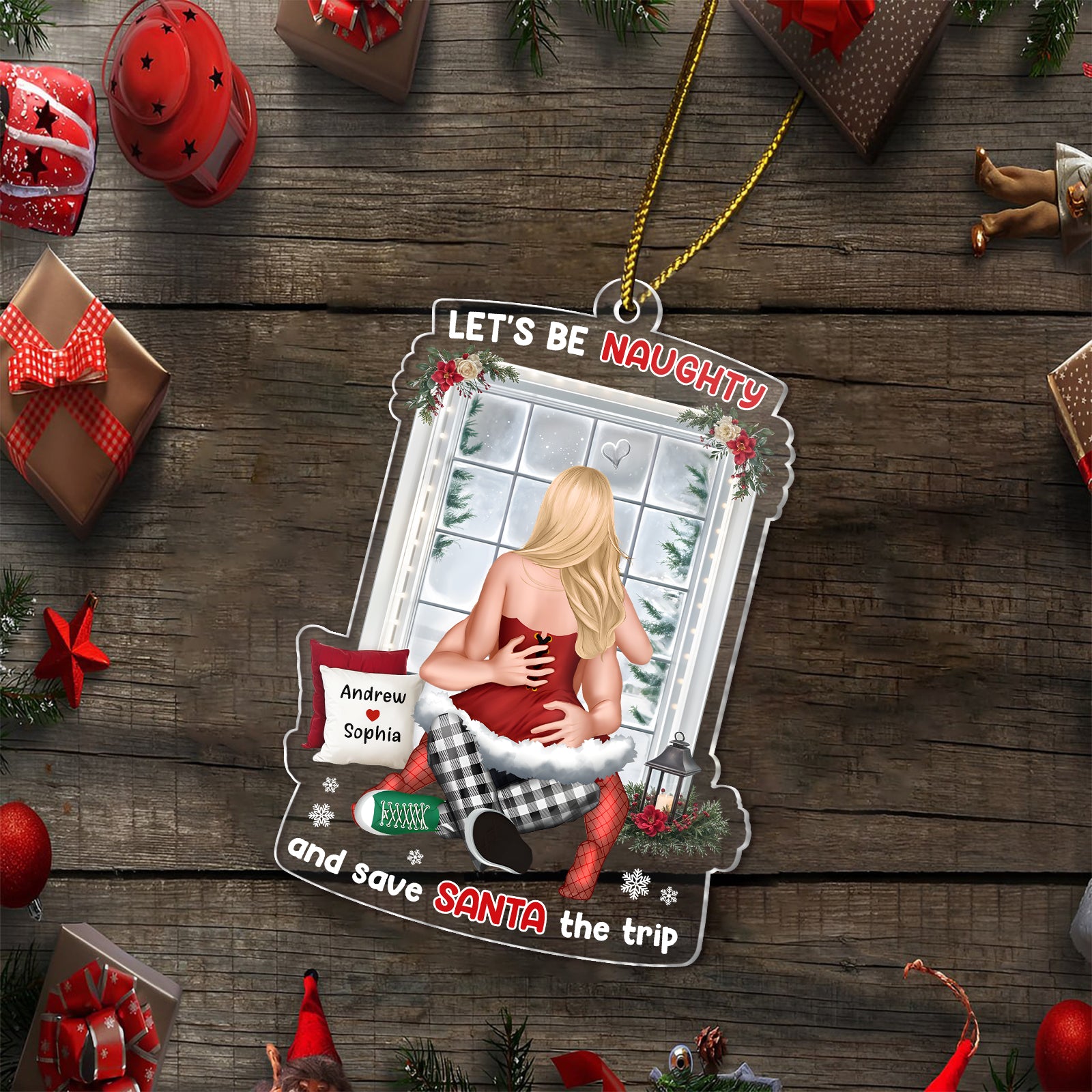 Close up of a custom couple ornament showing personalized hairstyles and skin tones on Santa-themed characters